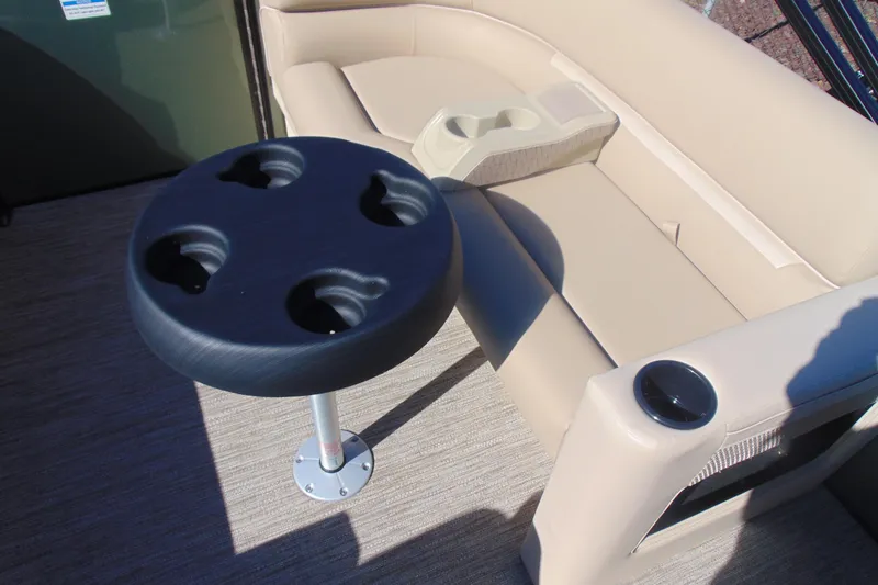 Slide: The Image of Interior of 2026 Godfrey Xperience 2086SBX pontoon boat with seating and cup holders. - 11