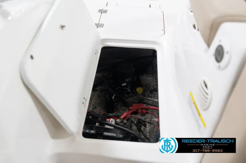 Slide: The Image of Open storage compartment in a 2017 Hurricane SunDeck Sport 202 OB boat. - 30