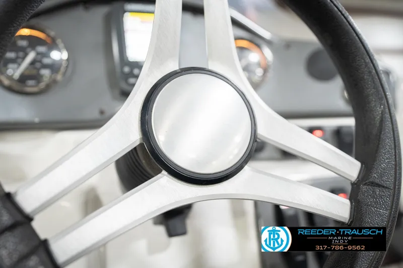 Slide: The Image of Steering wheel of 2017 Hurricane SunDeck Sport 202 OB boat, dashboard view. - 33