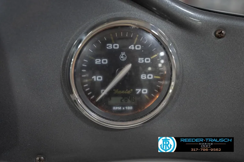 Slide: The Image of Close-up of a 2017 Hurricane SunDeck Sport 202 OB tachometer gauge. - 38
