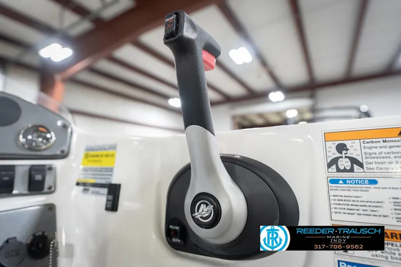 Slide: The Image of Close-up of 2017 Hurricane SunDeck Sport 202 OB throttle control in a boat showroom. - 43