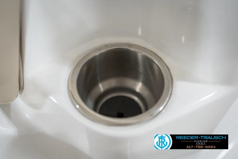 Slide: The Image of Cup holder on 2017 Hurricane SunDeck Sport 202 OB boat, featuring stainless steel finish. - 48