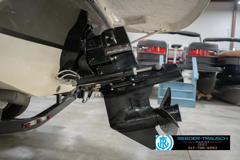 Slide: The Image of 2017 Hurricane SunDeck Sport 202 OB boat with MerCruiser engine in a showroom. - 50