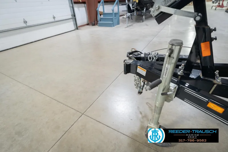 Slide: The Image of Trailer hitch of a 2017 Hurricane SunDeck Sport 202 OB in a showroom. - 55