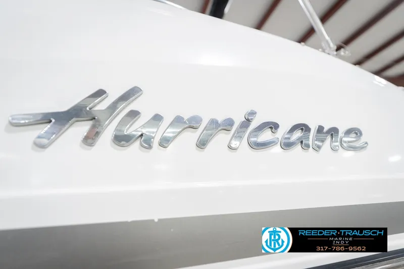 Slide: The Image of 2017 Hurricane SunDeck Sport 202 OB boat logo with dealership contact information. - 57