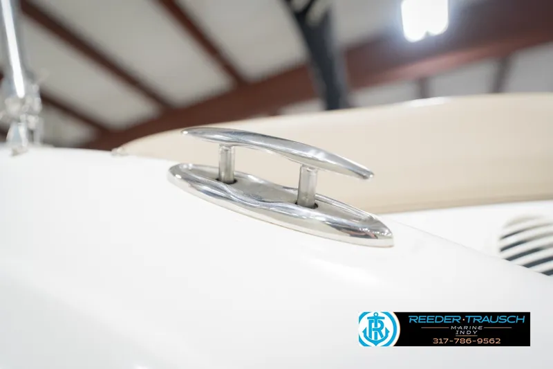 Slide: The Image of 2017 Hurricane SunDeck Sport 202 OB boat cleat detail in showroom. - 61