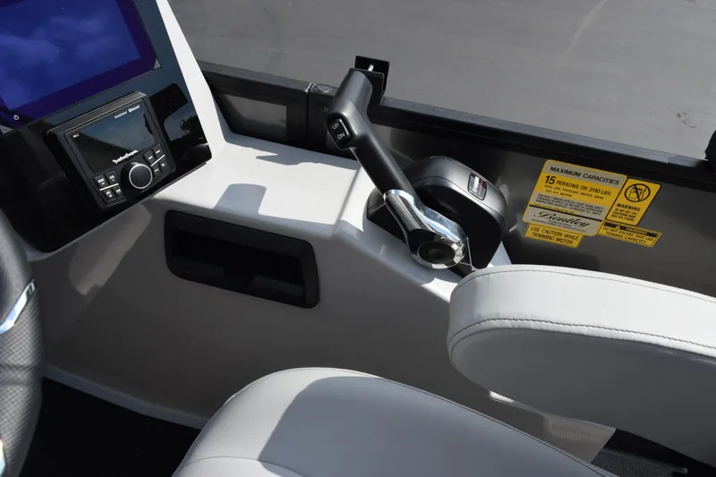 Slide: The Image of 2026 Bentley Pontoons Elite 223 Swingback dashboard with controls and seating. - 12