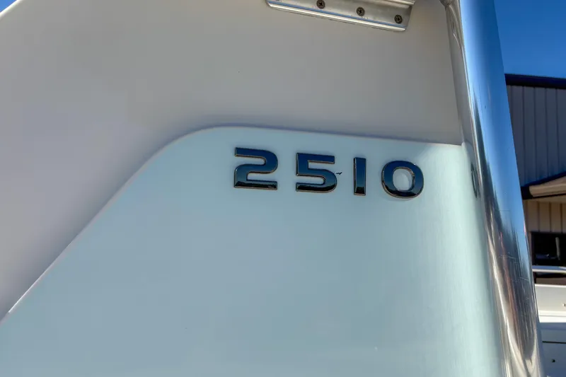 Slide: The Image of Close-up of 2019 Ranger 2510 Bay boat model number on white surface. - 4
