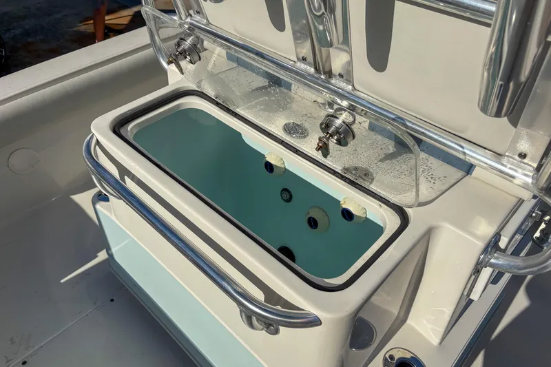 Slide: The Image of 2019 Ranger 2510 Bay boat livewell with stainless steel fittings and clear lid. - 7