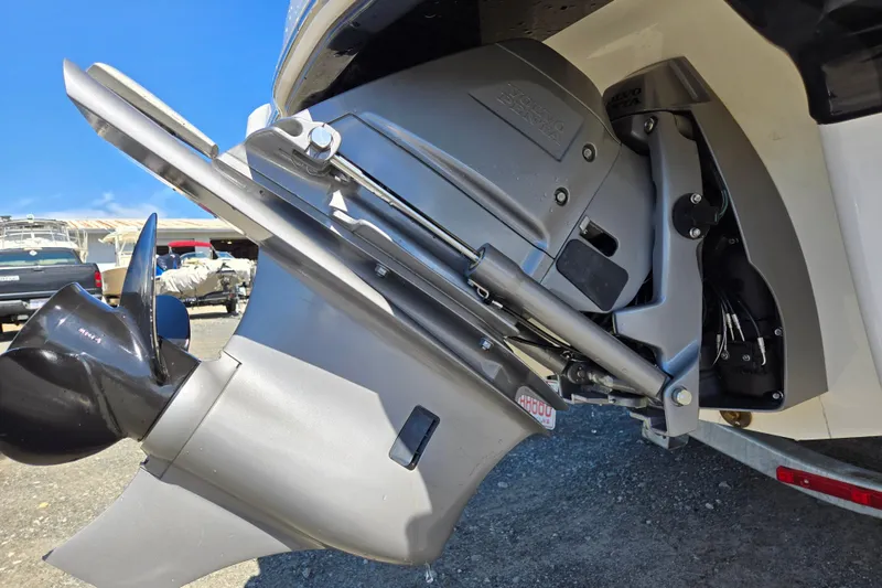 Slide: The Image of Close-up of 2012 Chaparral 196 SSi boat's outboard motor and propeller. - 16