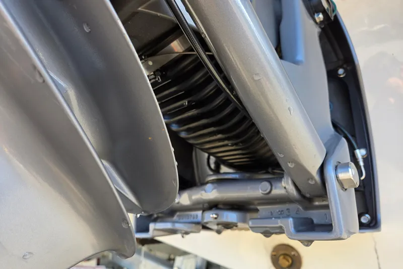 Slide: The Image of Close-up of 2012 Chaparral 196 SSi boat engine components, showcasing metallic details. - 18