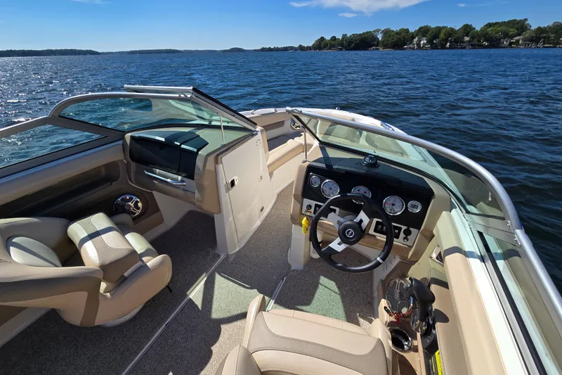 Slide: The Image of Interior of 2012 Chaparral 196 SSi boat on a sunny lake. - 20