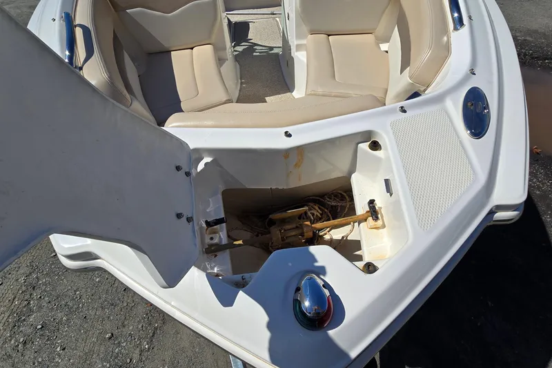 Slide: The Image of 2012 Chaparral 196 SSi boat interior with open storage compartment. - 28