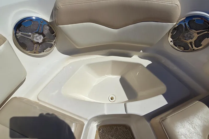 Slide: The Image of Interior of 2012 Chaparral 196 SSi boat with beige seating and speaker system. - 42