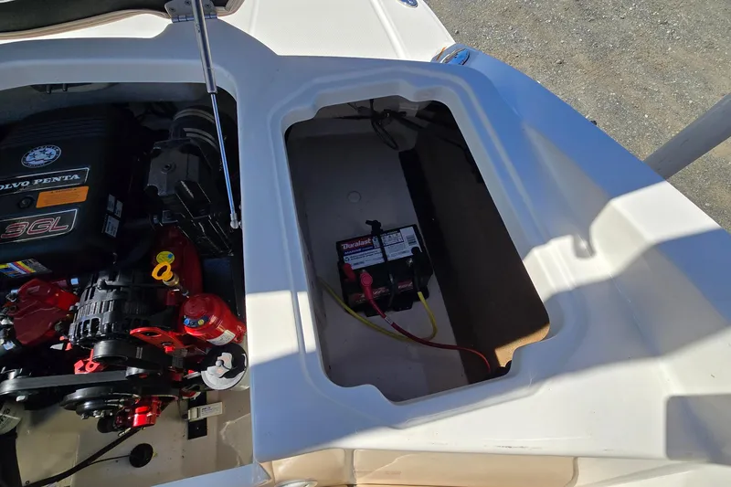 Slide: The Image of Engine compartment of 2012 Chaparral 196 SSi boat with Volvo Penta 3.0GL engine and battery. - 44