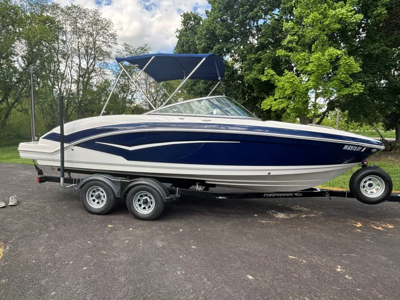The Image of 2017 Chaparral Vortex 223 VR boat on trailer, blue hull, bimini top. - 0