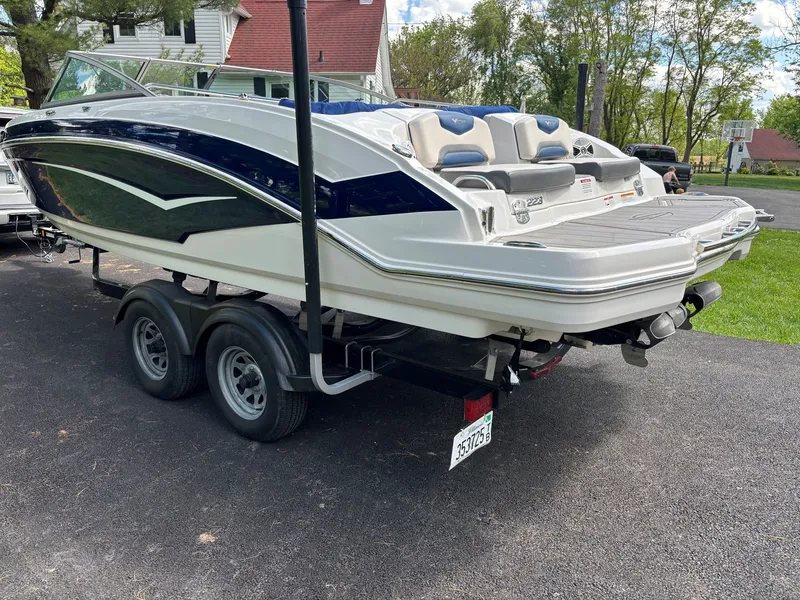 Slide: The Image of 2017 Chaparral Vortex 223 VR boat on trailer outdoors. - 10