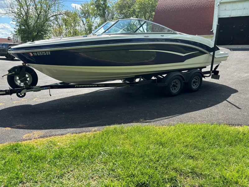 Slide: The Image of 2017 Chaparral Vortex 223 VR boat on trailer outdoors. - 14
