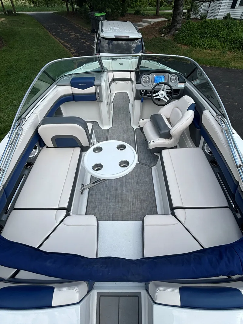 Slide: The Image of Interior of a 2017 Chaparral Vortex 223 VR boat with seating area. - 4