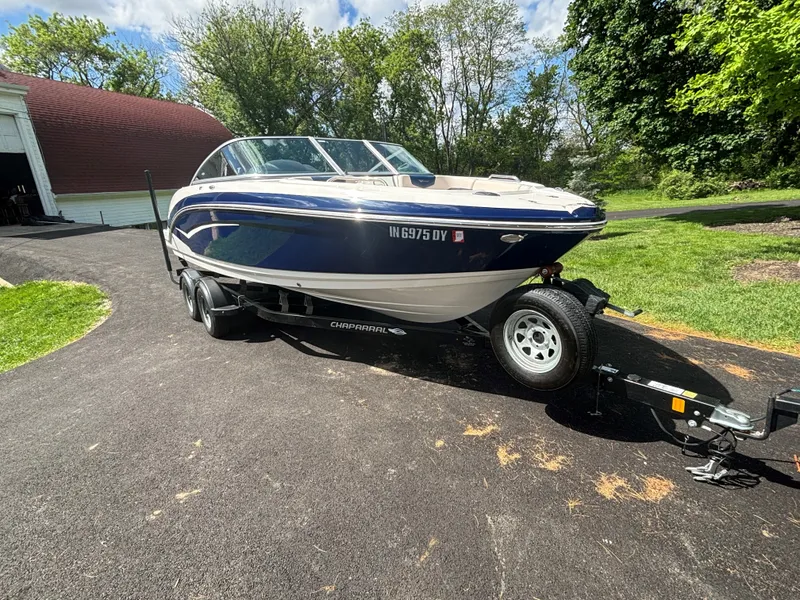 Slide: The Image of 2017 Chaparral Vortex 223 VR boat on trailer outdoors. - 8