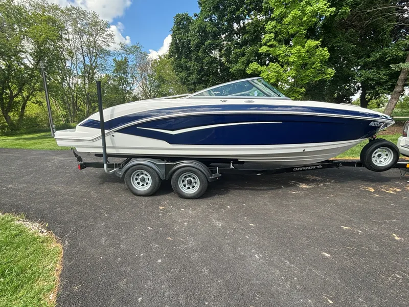 Slide: The Image of 2017 Chaparral Vortex 223 VR boat on trailer outdoors. - 9