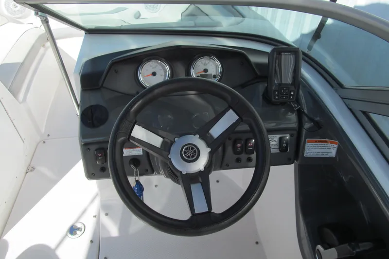 Slide: The Image of 2017 Yamaha Boats SX190 dashboard with stereo system and control panel. - 6