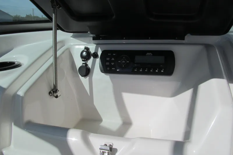 Slide: The Image of 2017 Yamaha Boats SX190 interior with spacious seating and built-in speakers. - 7