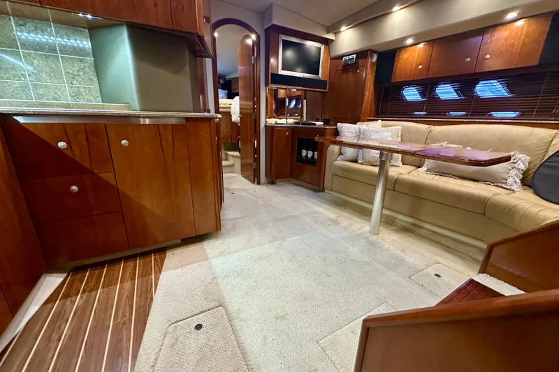 Slide: The Image of Luxurious interior of 2009 Cruisers Yachts 460 Express with elegant wood finishes. - 27