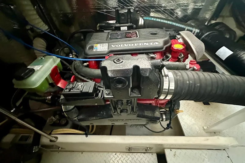 Slide: The Image of Engine compartment of 2009 Cruisers Yachts 460 Express with Volvo Penta engine. - 31