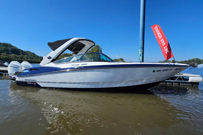 The Image of 2019 Monterey 305SS Super Sport boat docked on a sunny day. - 1
