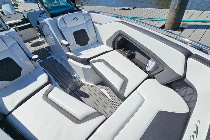 Slide: The Image of 2019 Monterey 305SS Super Sport boat interior with luxurious seating and modern design. - 25