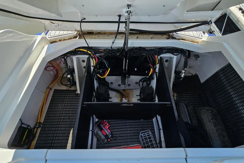 Slide: The Image of Engine compartment of 2019 Monterey 305SS Super Sport boat, showing wiring and components. - 36
