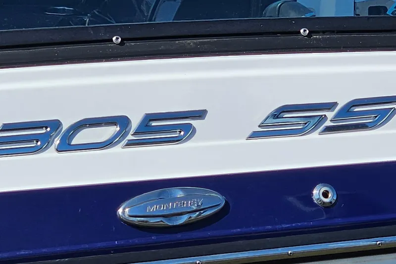 Slide: The Image of 2019 Monterey 305SS Super Sport boat emblem and model nameplate. - 39