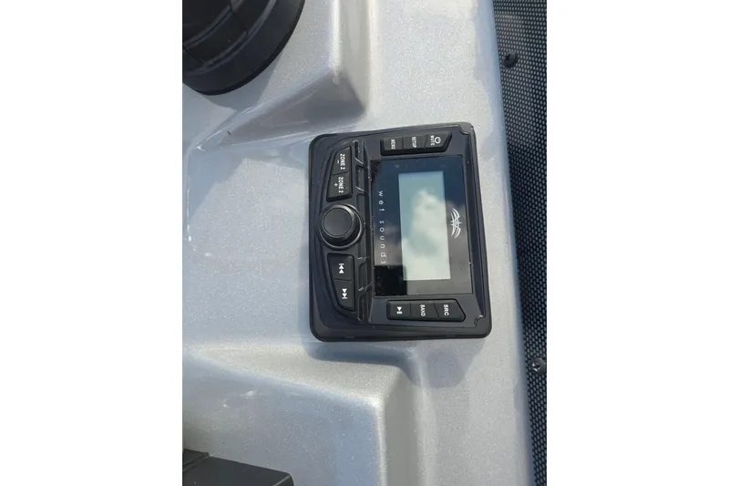 Slide: The Image of 2024 Xpress H22B Bay boat audio control panel with Wet Sounds display. - 13