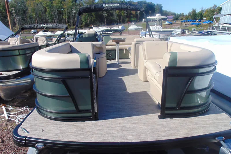 Slide: The Image of 2026 Godfrey SWEETWATER 2286 SFL pontoon boat with spacious seating and modern design. - 2