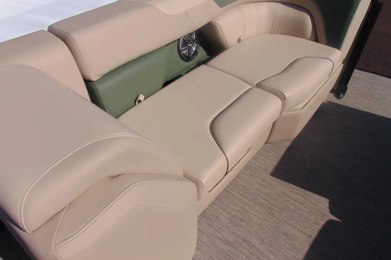 Slide: The Image of 2026 Godfrey SWEETWATER 2286 SFL boat seating, beige upholstery with integrated speaker. - 9