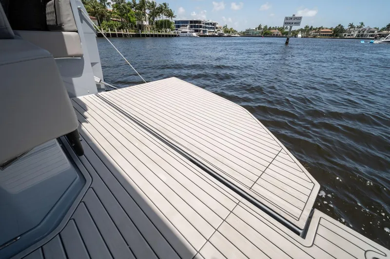 Slide: The Image of Luxury yacht deck on water, Hanover 387, 2026 model, sunny day, waterfront view. - 22