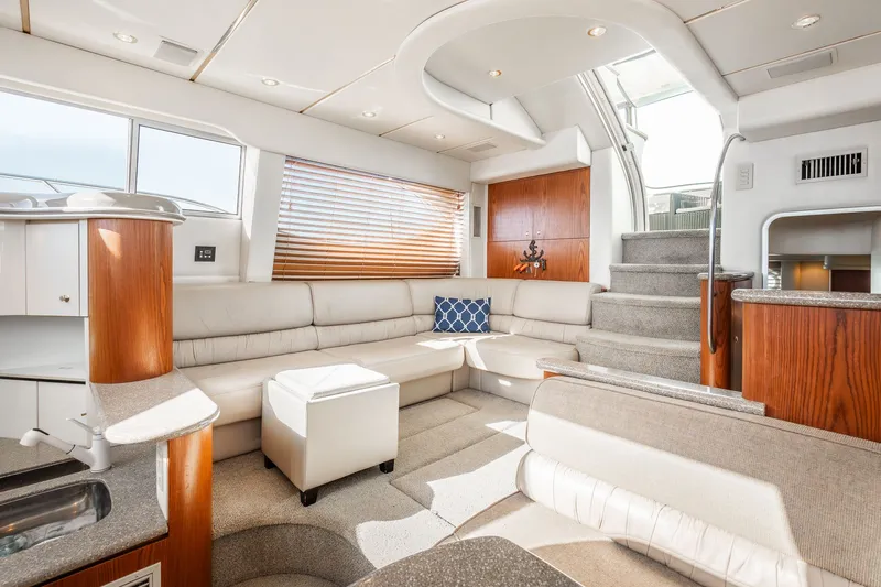 Slide: The Image of Luxurious interior of 1999 Maxum 4100 SCA Motor Yacht with plush seating and modern design. - 33