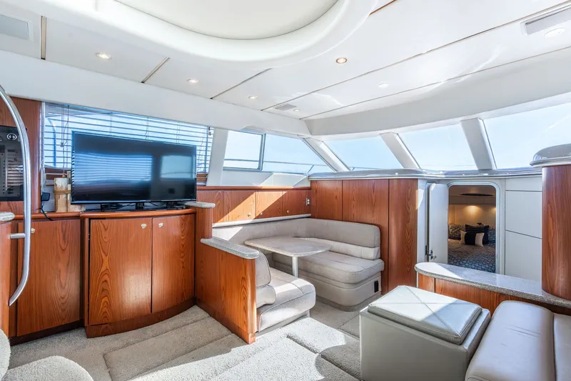 Slide: The Image of Luxurious interior of 1999 Maxum 4100 SCA Motor Yacht with plush seating and modern amenities. - 37