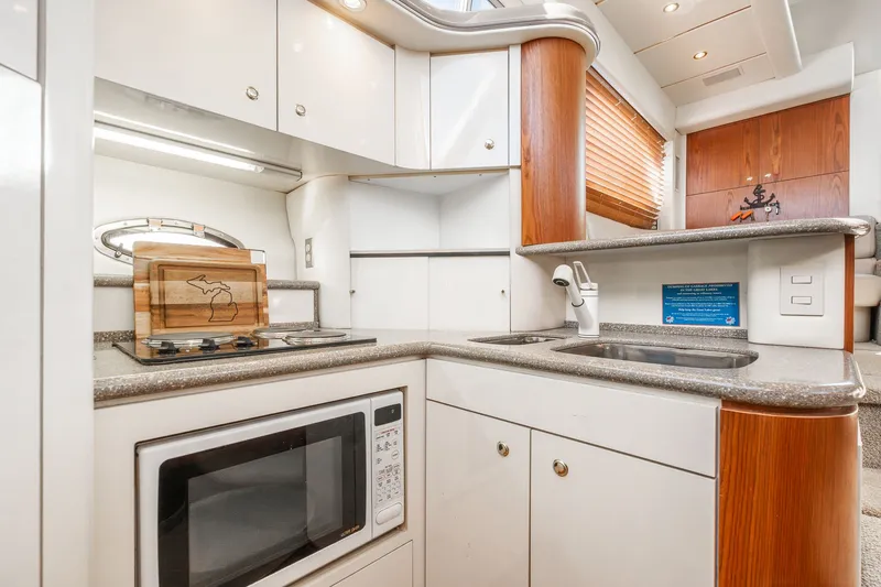 Slide: The Image of Modern kitchen in 1999 Maxum 4100 SCA Motor Yacht with microwave and stove. - 42