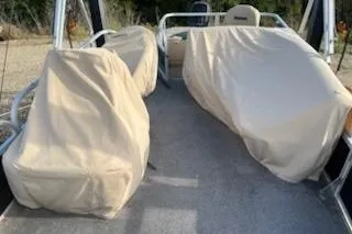 Slide: The Image of 2019 Sun Tracker Bass Buggy 18 DLX with covered seating on deck. - 6