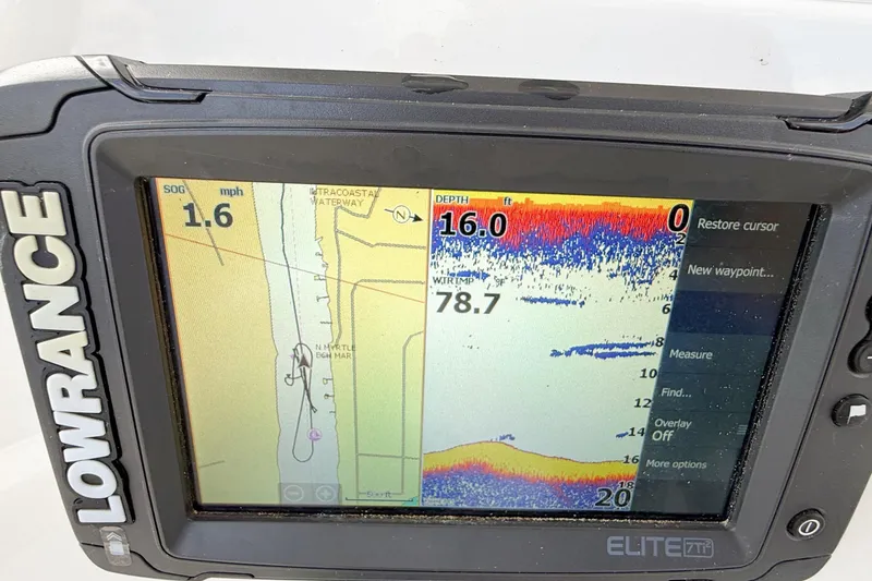 Slide: The Image of Lowrance Elite 7Ti fishfinder displaying depth and speed on a 2020 Pioneer 202 Islander. - 16
