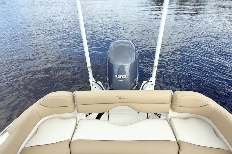 Slide: The Image of 2020 Pioneer 202 Islander boat with Yamaha 150 engine on calm water. - 9