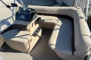 Slide: The Image of 2019 Sun Tracker Bass Buggy 16 DLX ET with beige seating and console. - 6