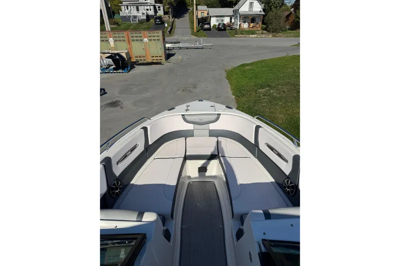 Slide: The Image of 2019 Chaparral 297 SSX boat interior with spacious seating and modern design. - 12