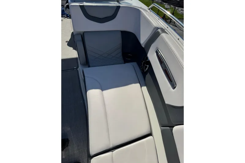 Slide: The Image of 2019 Chaparral 297 SSX boat interior seating with sleek design and comfortable upholstery. - 13