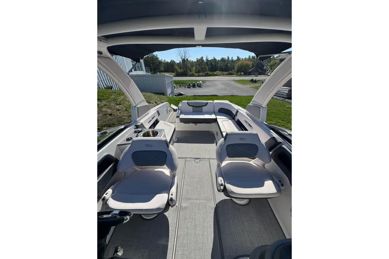 Slide: The Image of 2019 Chaparral 297 SSX boat interior with spacious seating and modern design. - 19