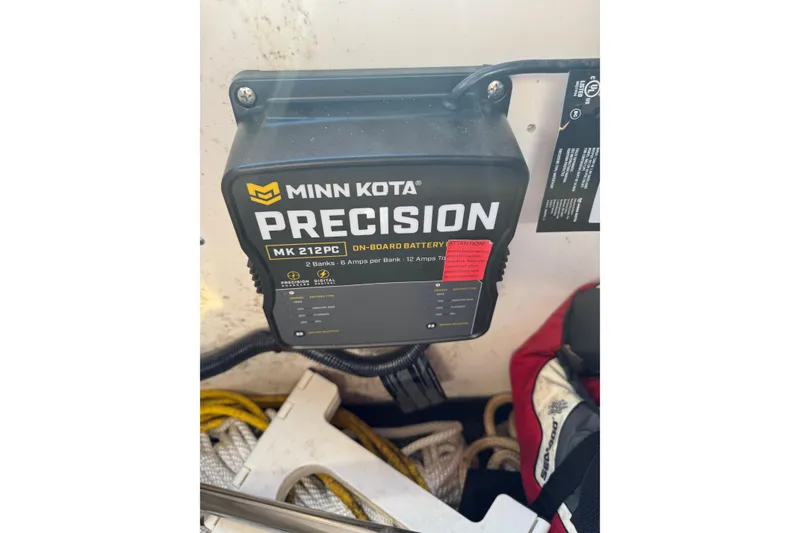 Slide: The Image of Minn Kota Precision MK 212PC on-board battery charger in 2019 Chaparral 297 SSX boat. - 28