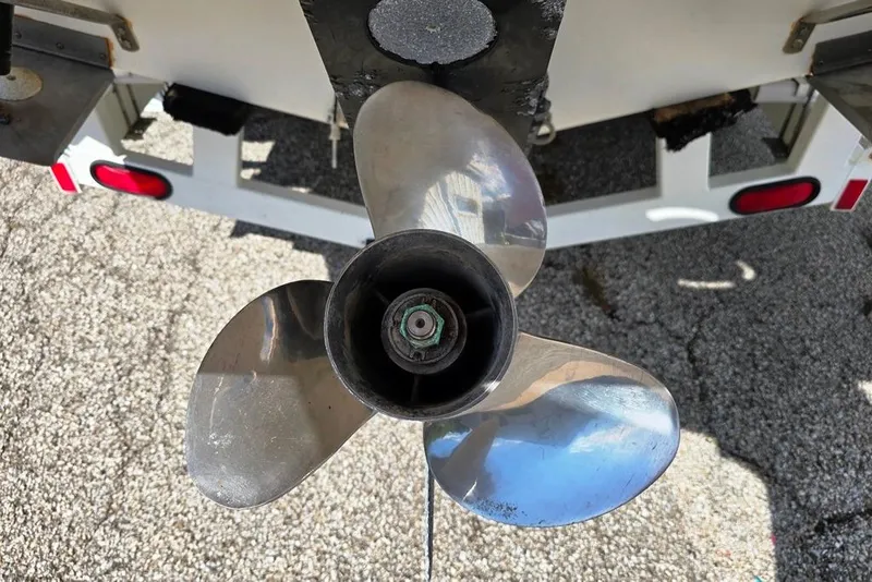 Slide: The Image of Close-up of a 1997 Sea Ray 240 Sundancer boat propeller on a trailer. - 19