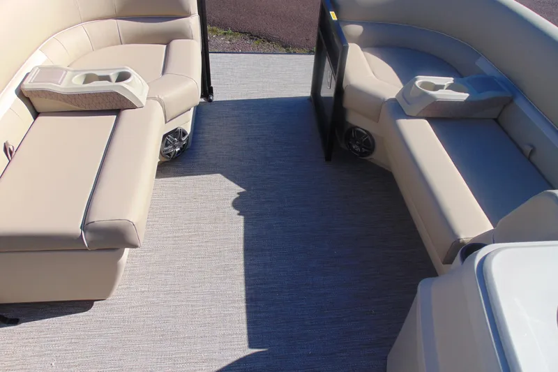 Slide: The Image of Interior of 2026 Godfrey EX 1880 Cruise boat with beige seating and cup holders. - 5